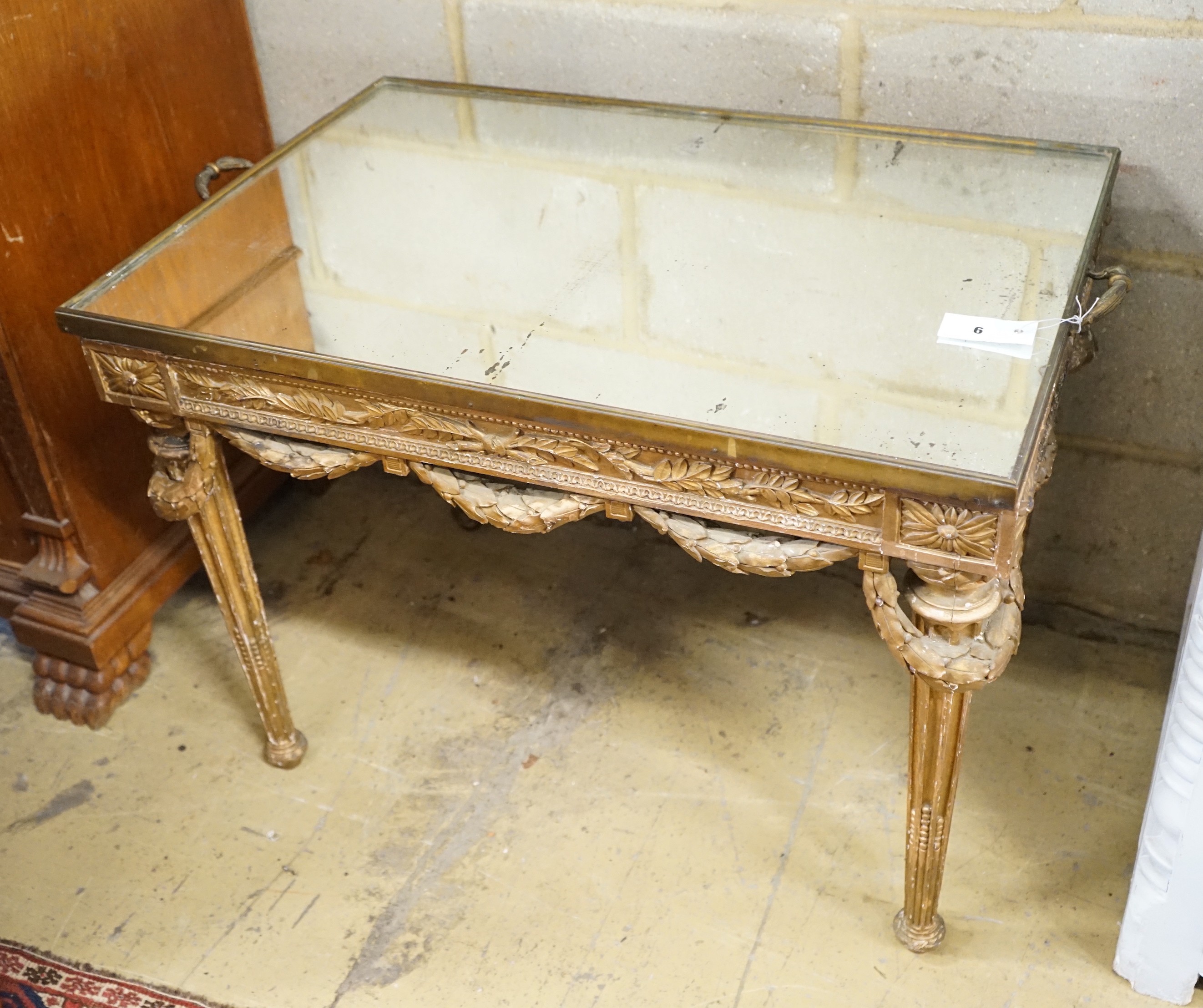An 18th century style rectangular giltwood and gesso mirrored tray top table, width 80cm, depth 56cm, height 61cm